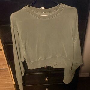 cropped green TNA sweater